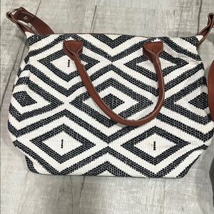 Chic Black and White Patterned Shoulder Bag with Brown Straps
